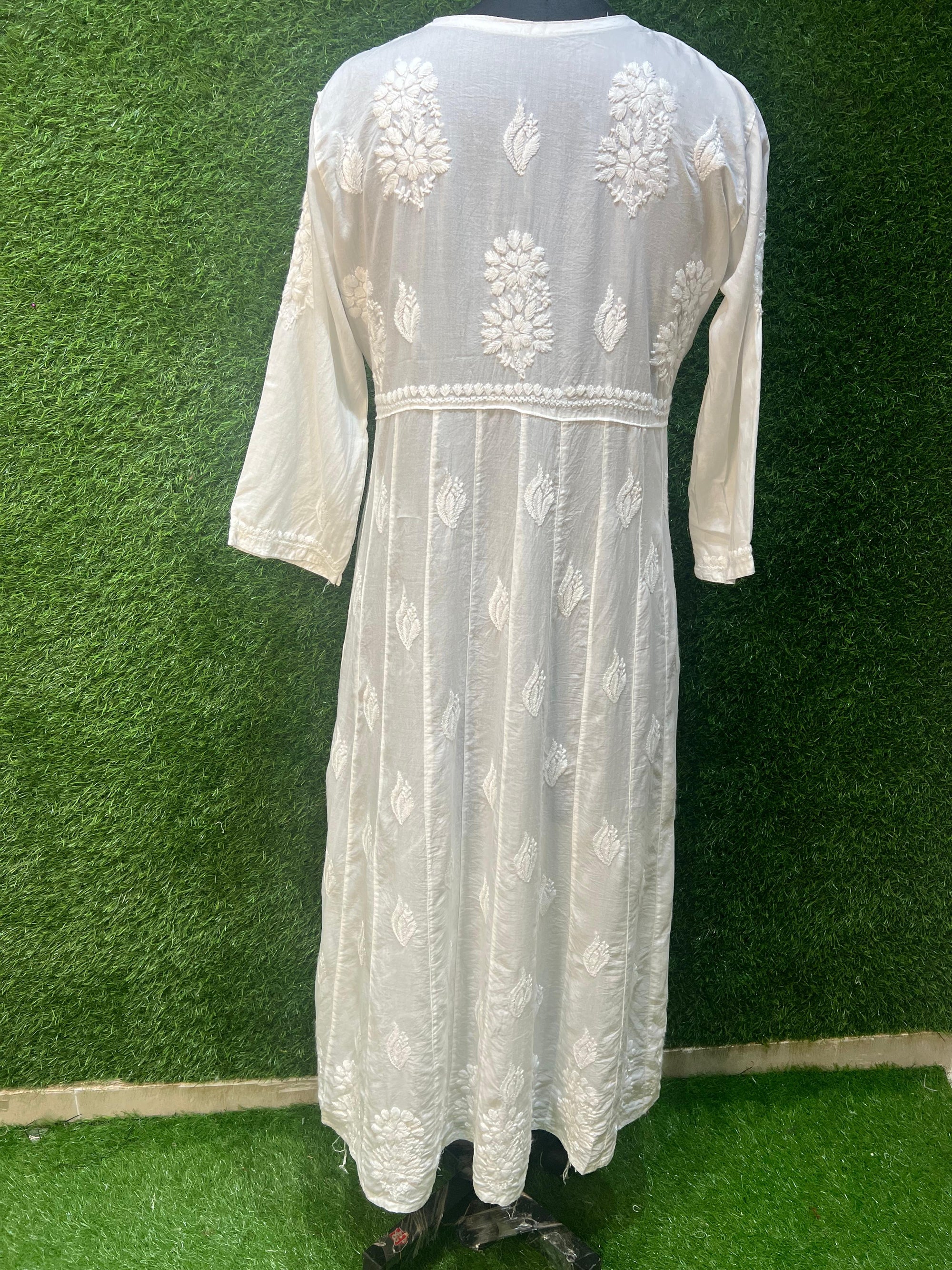 Step into timeless elegance with this exquisite Anarkali gown crafted from luxurious Modal fabric