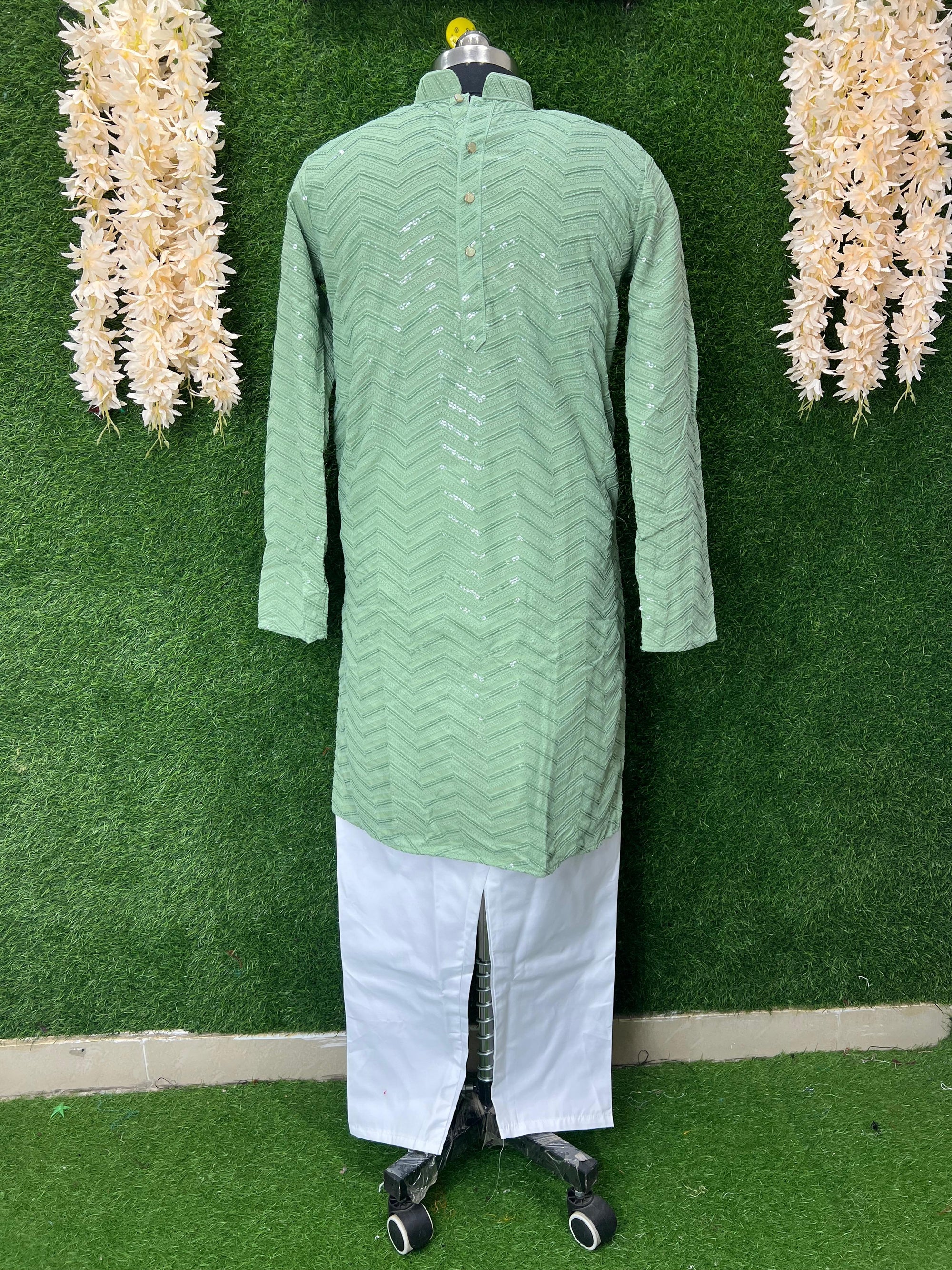 Unveil the magic of traditional craftsmanship with our Chikankari Kurta Set, enhanced with elegant sequin work. Designed for those who appreciate timeless style and refined detail—perfect for festive wear, mehendi, or evening gatherings.