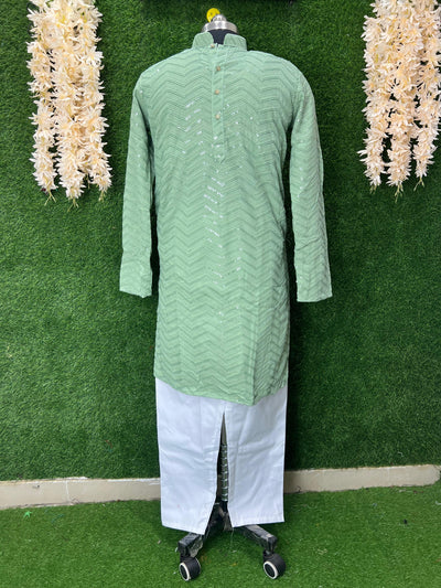 Unveil the magic of traditional craftsmanship with our Chikankari Kurta Set, enhanced with elegant sequin work. Designed for those who appreciate timeless style and refined detail—perfect for festive wear, mehendi, or evening gatherings.