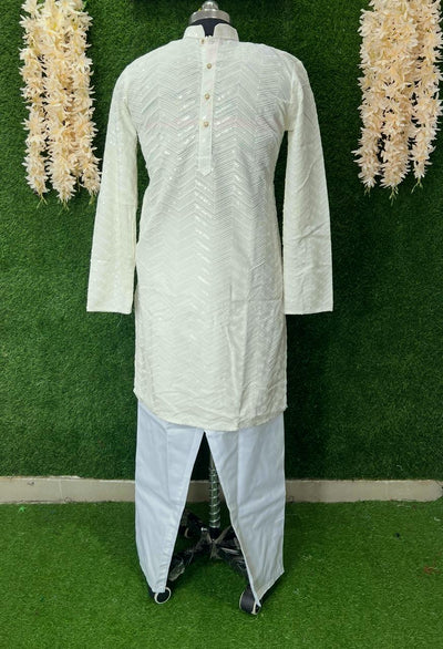 Step into elegance with our handcrafted Chikankari Kurta Set, beautifully adorned with delicate sequin work. Perfect for festive occasions, weddings, or celebrations, this outfit blends traditional Lucknowi charm with a subtle shimmer for a refined and graceful look.