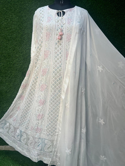 Lucknowi Chikankari Anarkali, a masterpiece that embodies tradition, sophistication, and fine craftsmanship. Designed to offer a regal silhouette, this Anarkali is perfect for those who appreciate heritage artistry.