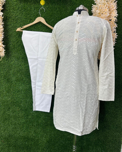 Feel effortlessly elegant in our luxurious Chikankari Kurta Set. With its fine threadwork and soft sequin accents, this piece strikes the perfect balance between cultural heritage and contemporary charm.