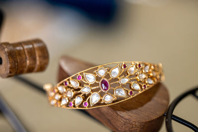 Nafrin rose gold kundan bracelet