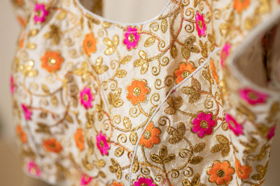 Multi colored stitched party floral blouse