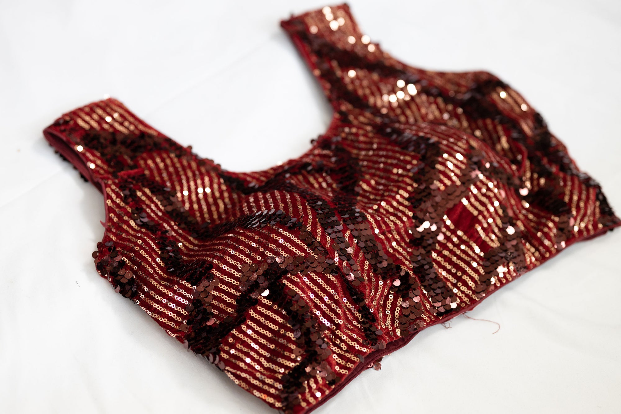 Jacquelin sequin stitched sleeveless blouse