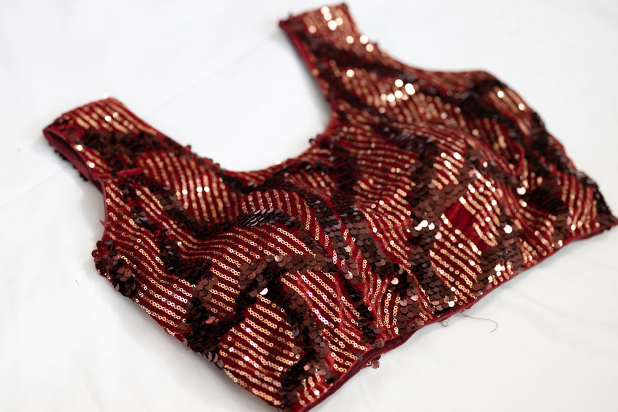 Jacquelin sequin stitched sleeveless blouse