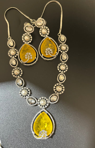 Rosy doublet stone with kundan and pearls necklace set