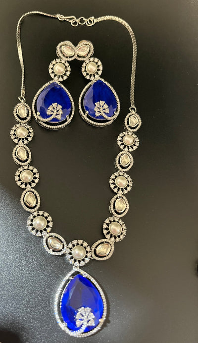 Rosy doublet stone with kundan and pearls necklace set