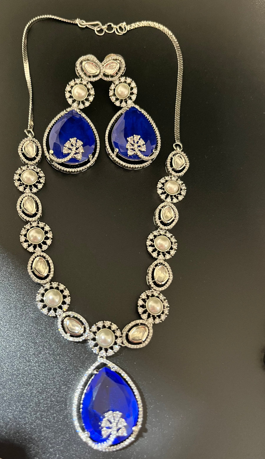 Rosy doublet stone with kundan and pearls necklace set