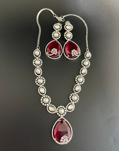 Rosy doublet stone with kundan and pearls necklace set