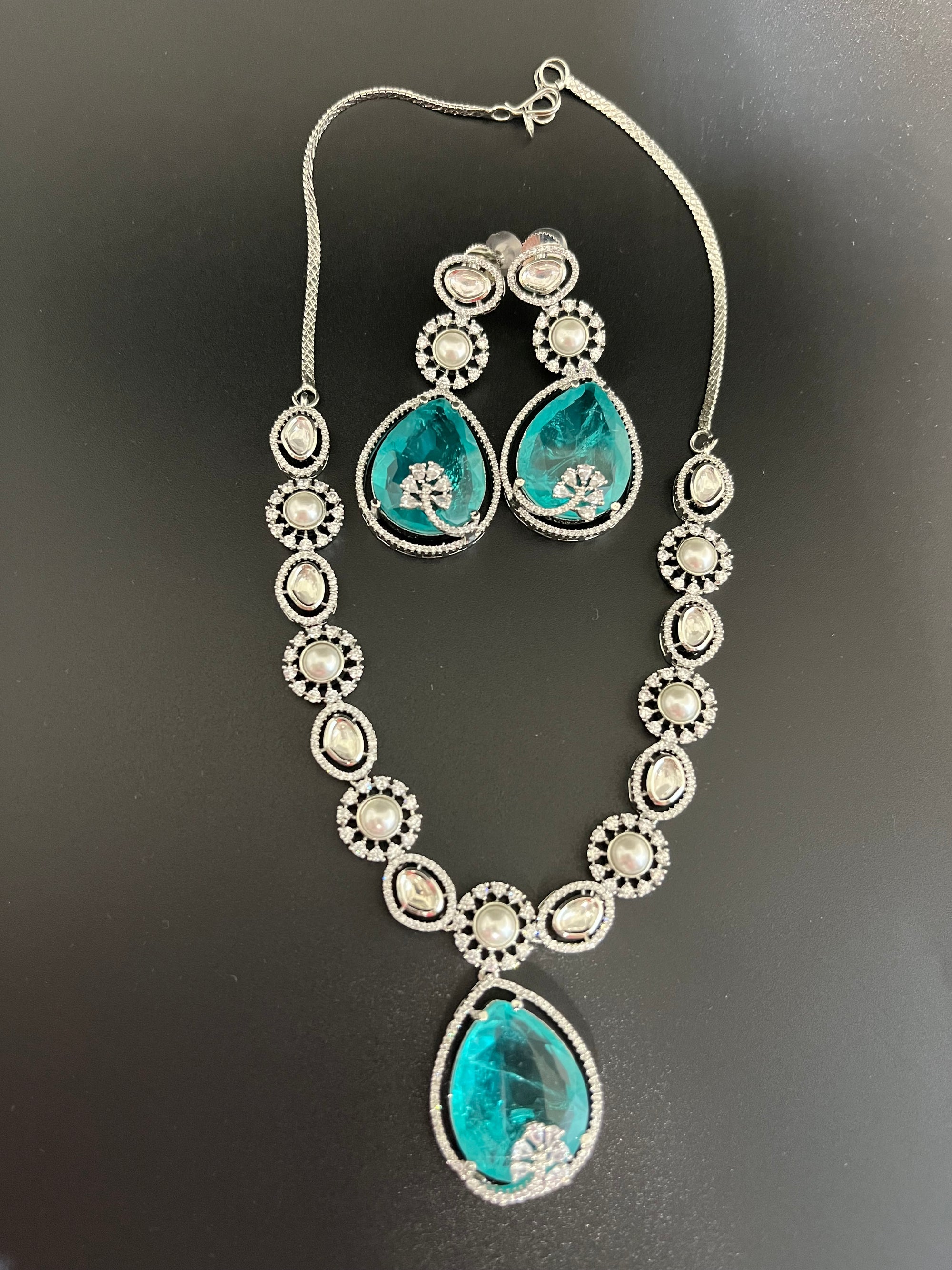 Rosy doublet stone with kundan and pearls necklace set