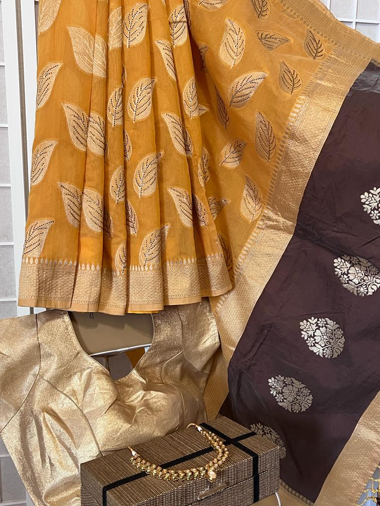 Priyanshi golden leaves silk saree