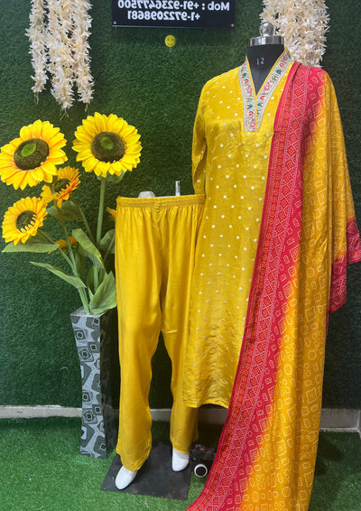 Bandhani with this beautifully crafted Bandhani Suit Set, a perfect blend of tradition and elegance. Designed with intricate tie-dye patterns, this ensemble reflects timeless artistry while offering a graceful silhouette.