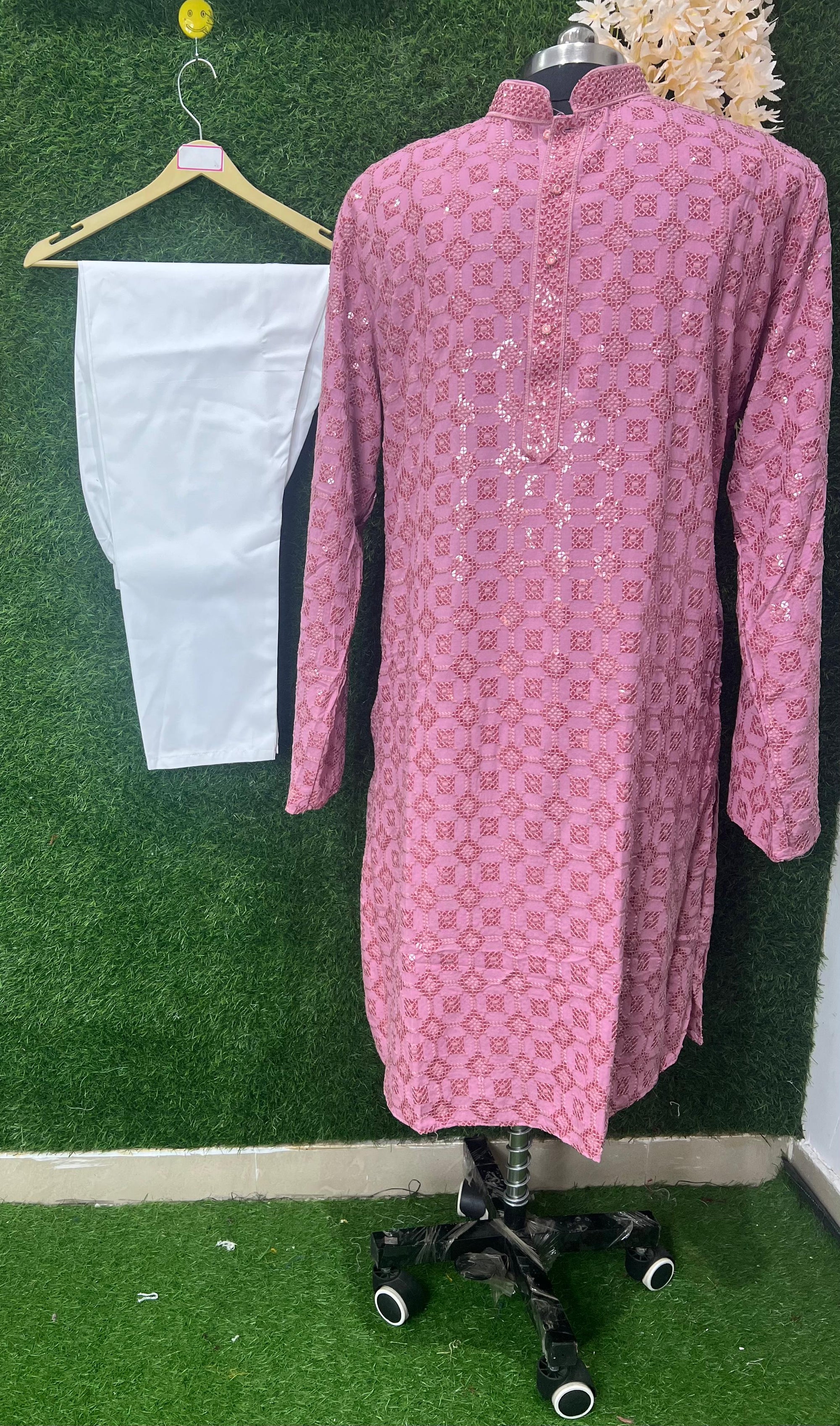 Lucknowi charm with a subtle shimmer for a refined and graceful look.