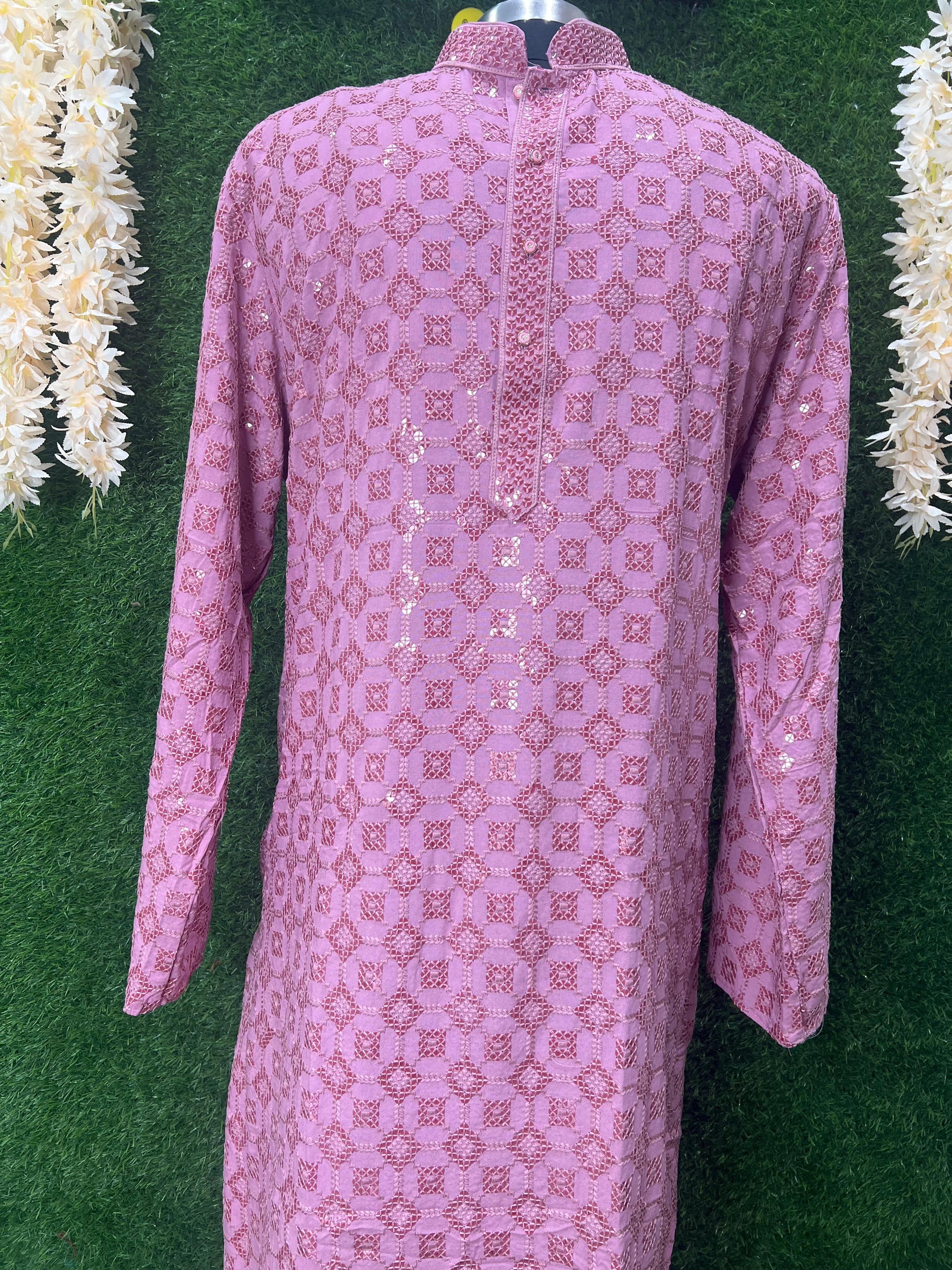 Inspired by Lucknow’s timeless artistry, this kurta set features airy fabric, traditional embroidery, and a dash of sequins to add festive charm. Ideal for pooja, Diwali, or Raksha Bandhan.