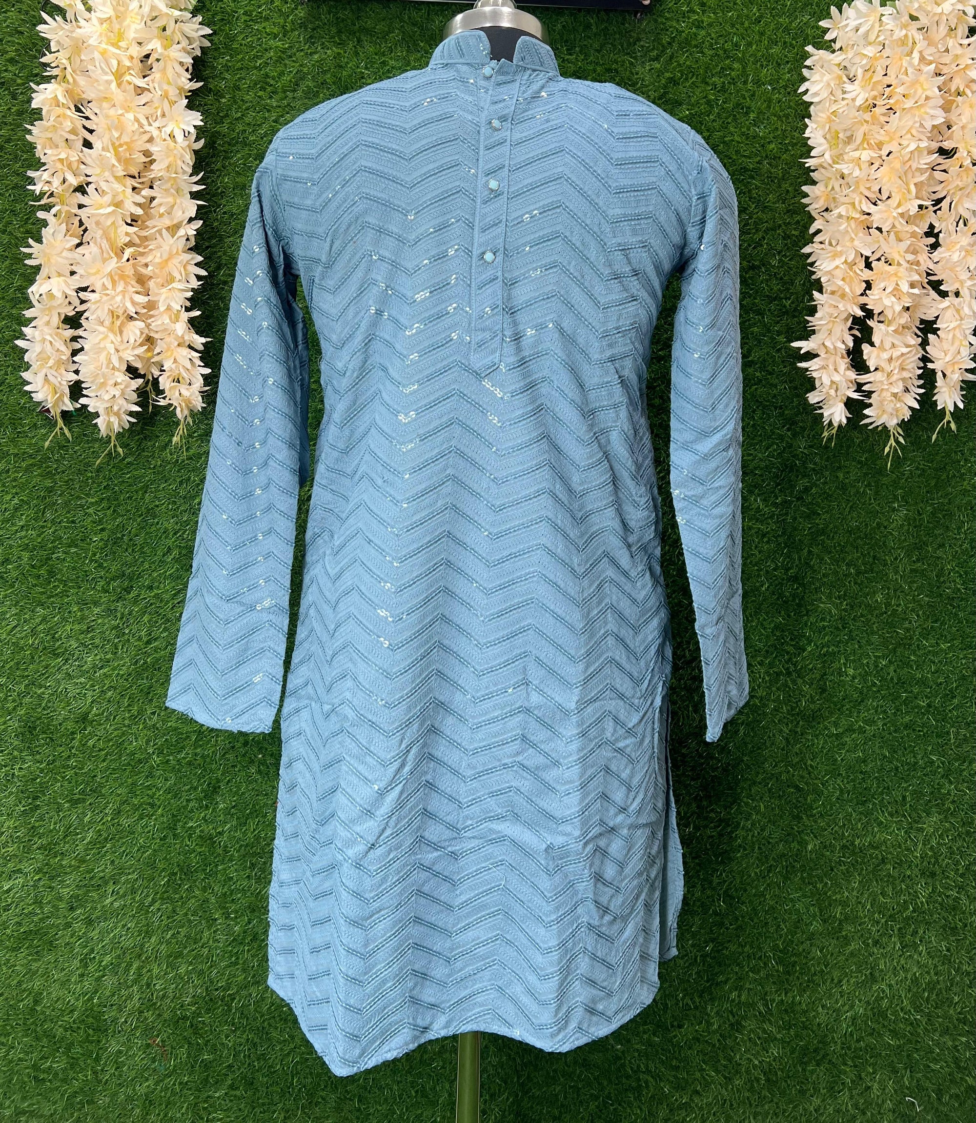 Feel effortlessly elegant in our luxurious Chikankari Kurta Set. With its fine threadwork and soft sequin accents, this piece strikes the perfect balance between cultural heritage and contemporary charm.