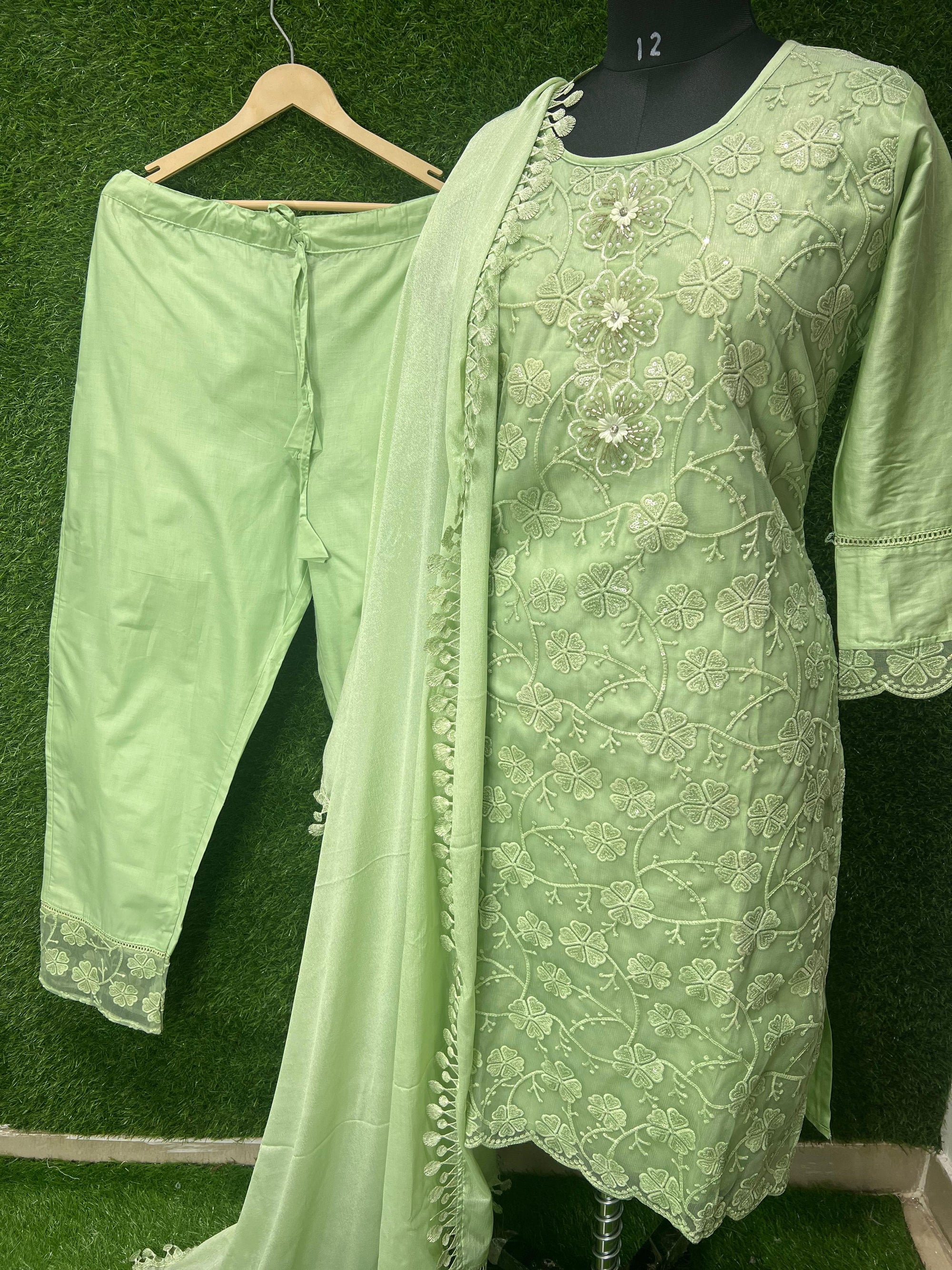 This beautifully embroidered Kurta Set
Featuring intricate floral embroidery and delicate sequin accents, this outfit is perfect for festive gatherings or casual outings