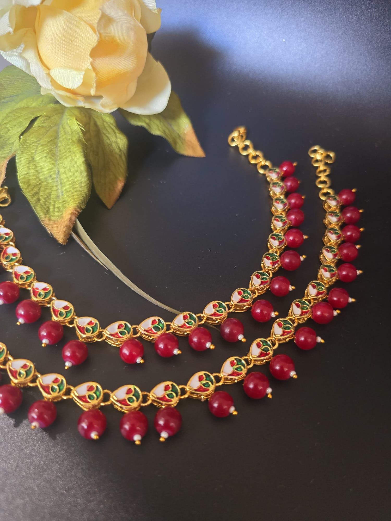 Kundan Anklet, featuring Back Meena detailing for a luxurious finish. This stunning piece showcases the finest craftsmanship, blending heritage artistry with contemporary elegance.
