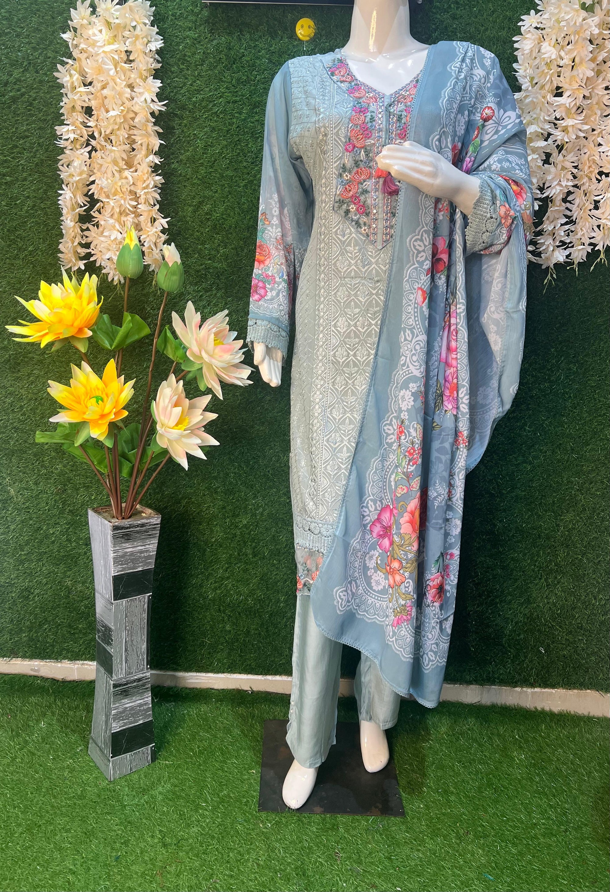 A Georgette suit set featuring Chikankari and 3D embroidery combines traditional Lucknowi hand embroidery with contemporary 3D embellishments, creating an elegant ensemble suitable for various occasions.