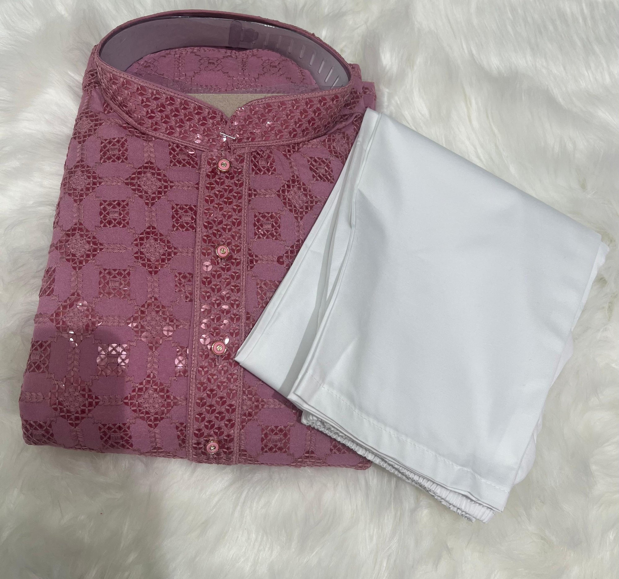 Inspired by Lucknow’s timeless artistry, this kurta set features airy fabric, traditional embroidery, and a dash of sequins to add festive charm. Ideal for pooja, Diwali, or Raksha Bandhan.