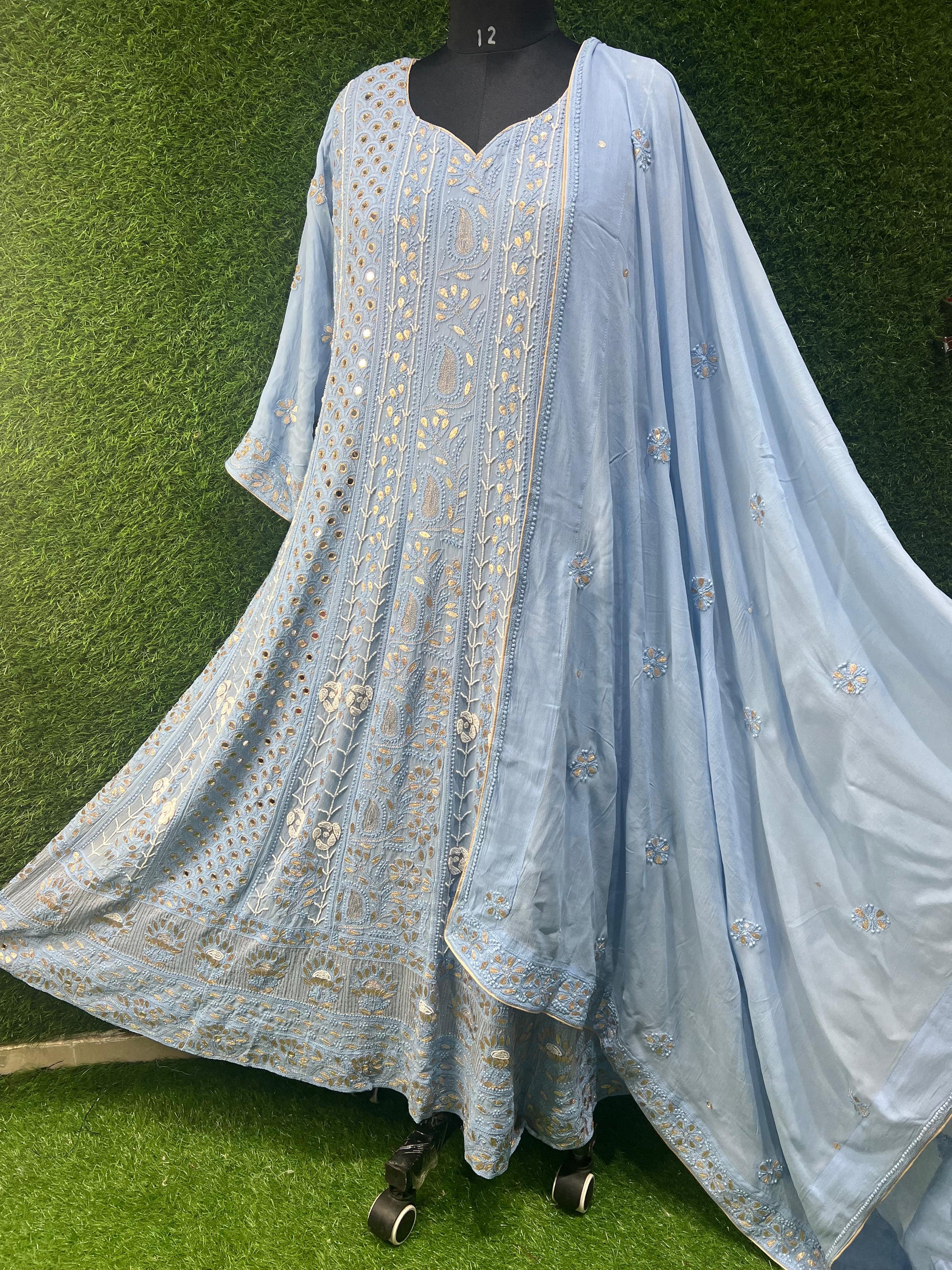 Lucknowi Chikankari Anarkali with Gota Patti Work, a timeless piece that celebrates the beauty of intricate hand embroidery and rich craftsmanship. Designed to exude royalty, this Anarkali is a perfect blend of tradition and modern sophistication.