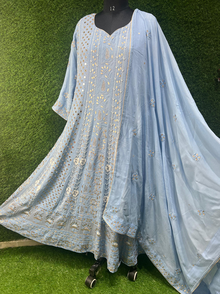Lucknowi Chikankari Anarkali with Gota Patti Work, a timeless piece that celebrates the beauty of intricate hand embroidery and rich craftsmanship. Designed to exude royalty, this Anarkali is a perfect blend of tradition and modern sophistication.
