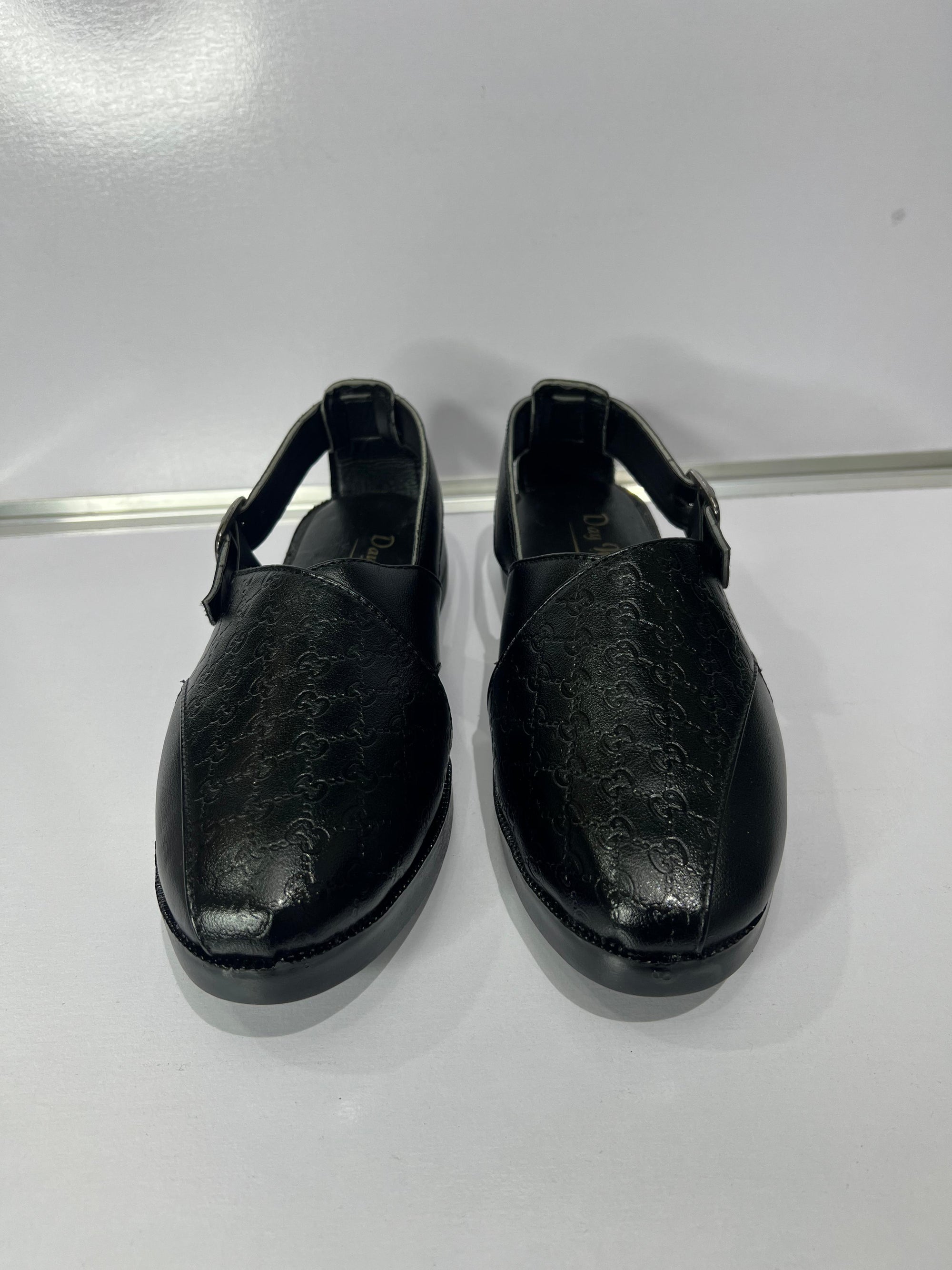 Hand-stitched by master artisans, this luxury edition of our Peshawari sandals speaks sophistication. With supple full-grain leather, polished brass buckle, and shock-absorbing soles, this piece blends premium quality with cultural depth. Limited edition. For men who walk with elegance.