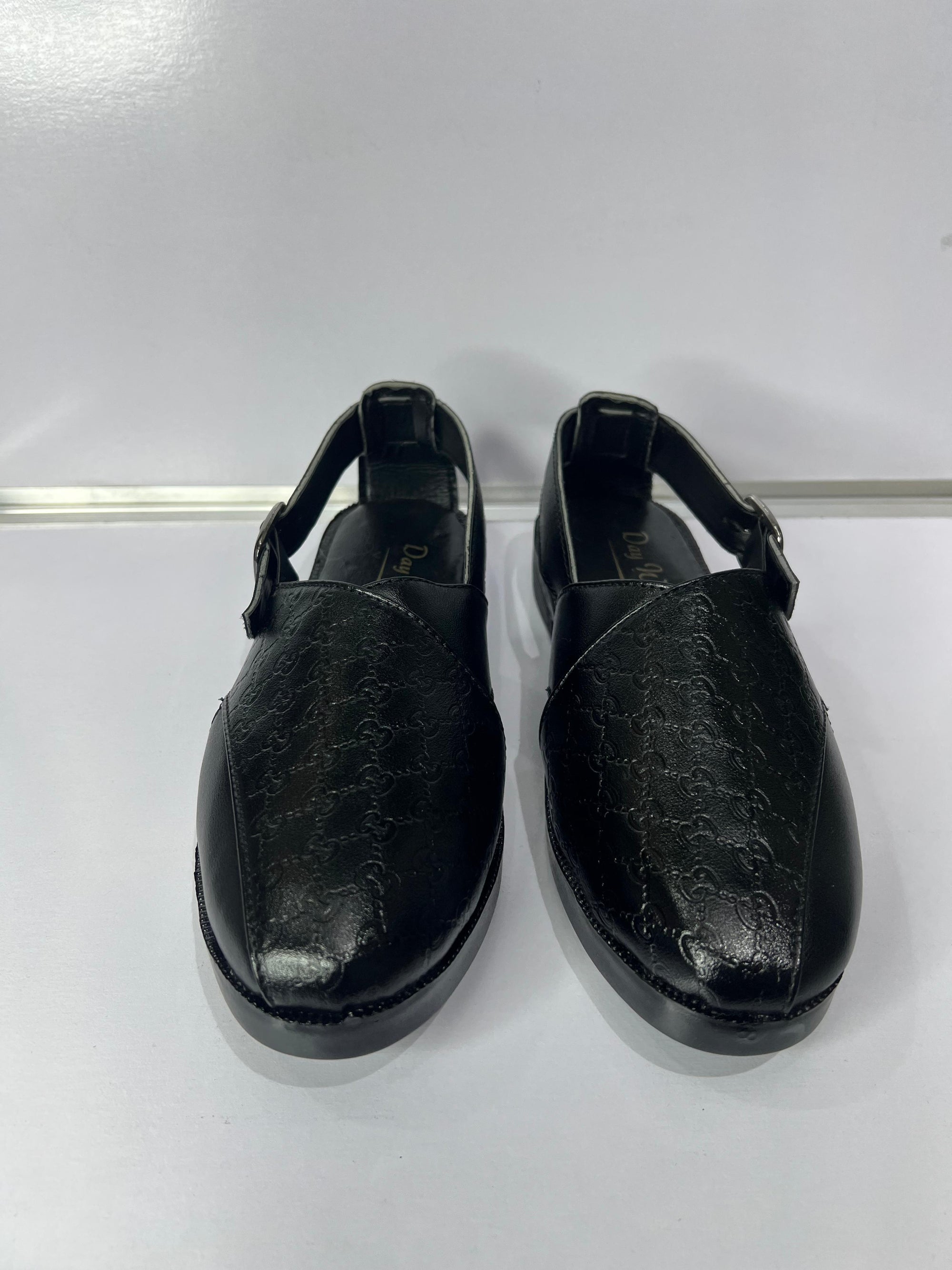 Hand-stitched by master artisans, this luxury edition of our Peshawari sandals speaks sophistication. With supple full-grain leather, polished brass buckle, and shock-absorbing soles, this piece blends premium quality with cultural depth. Limited edition. For men who walk with elegance.