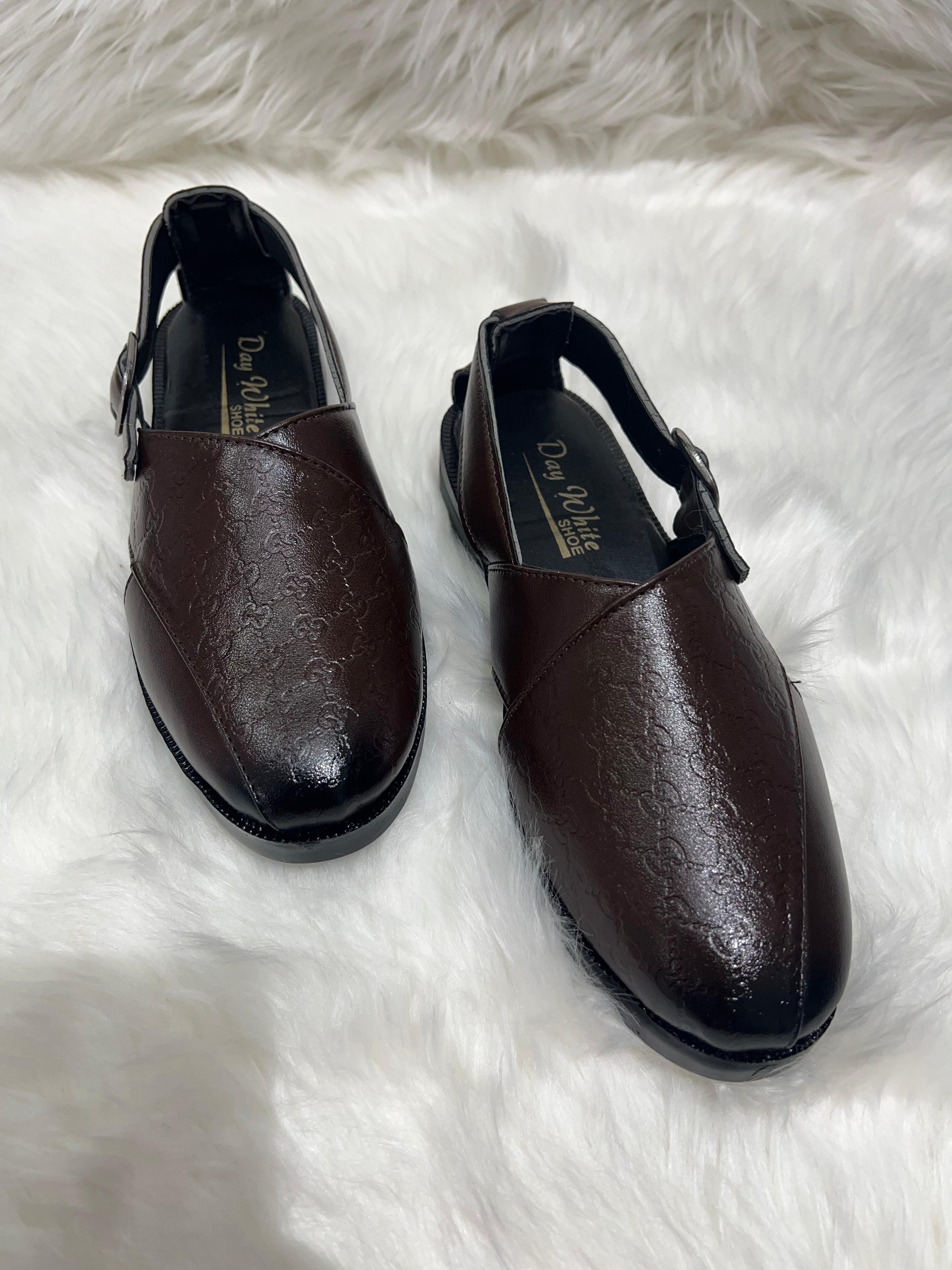 Built for comfort. Styled for culture. Whether you're heading to the mosque, the market, or out for tea with friends, these Peshawari sandals keep your feet relaxed while maintaining a traditional vibe. Soft leather, breathable inner lining, and durable soles make them a staple for every desi wardrobe.