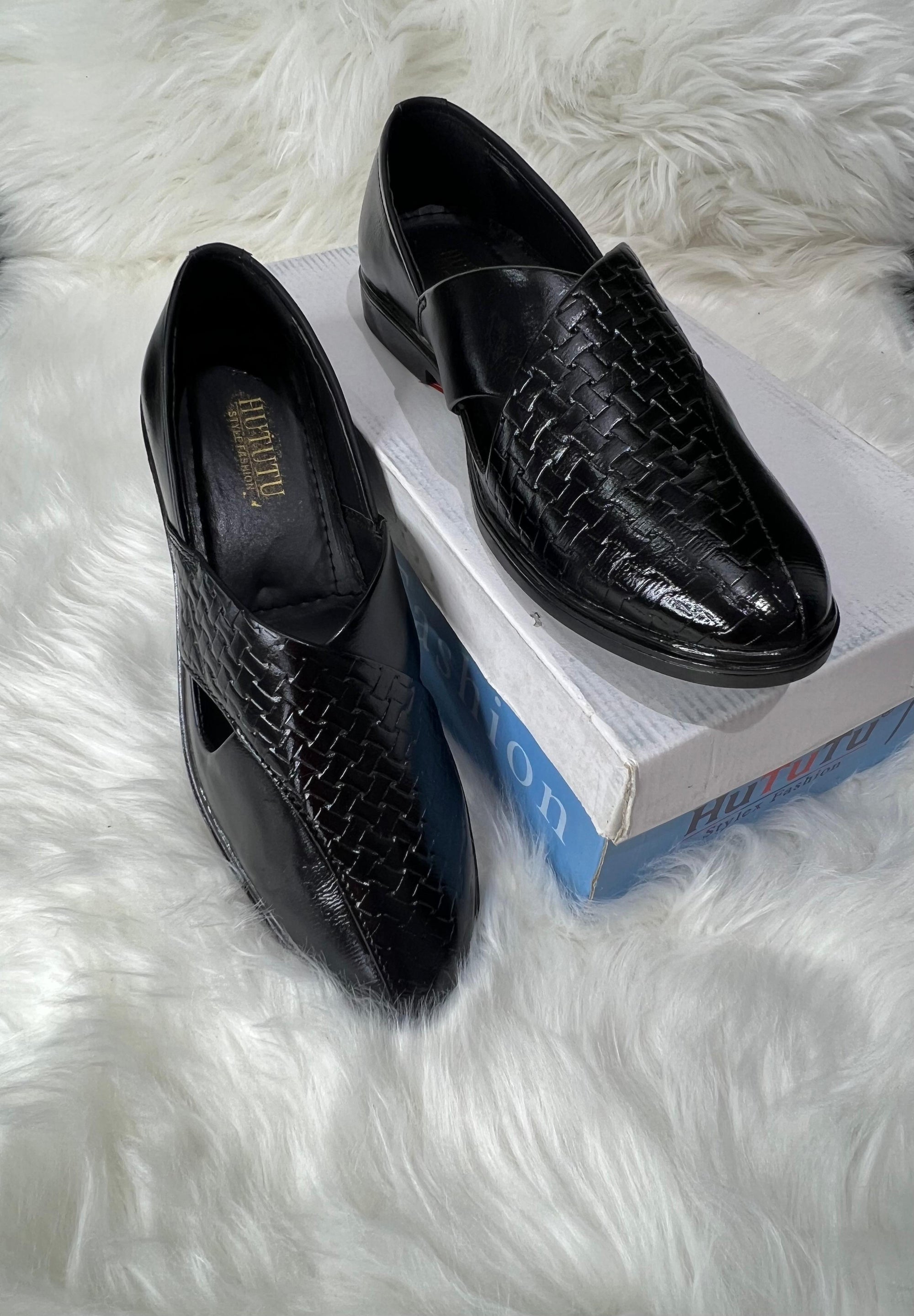 Elegance under every sherwani. These handcrafted black leather Peshawari sandals are made for weddings, formal celebrations, and cultural occasions. Soft lining, supportive sole, and regal design – made to match your moment of pride.