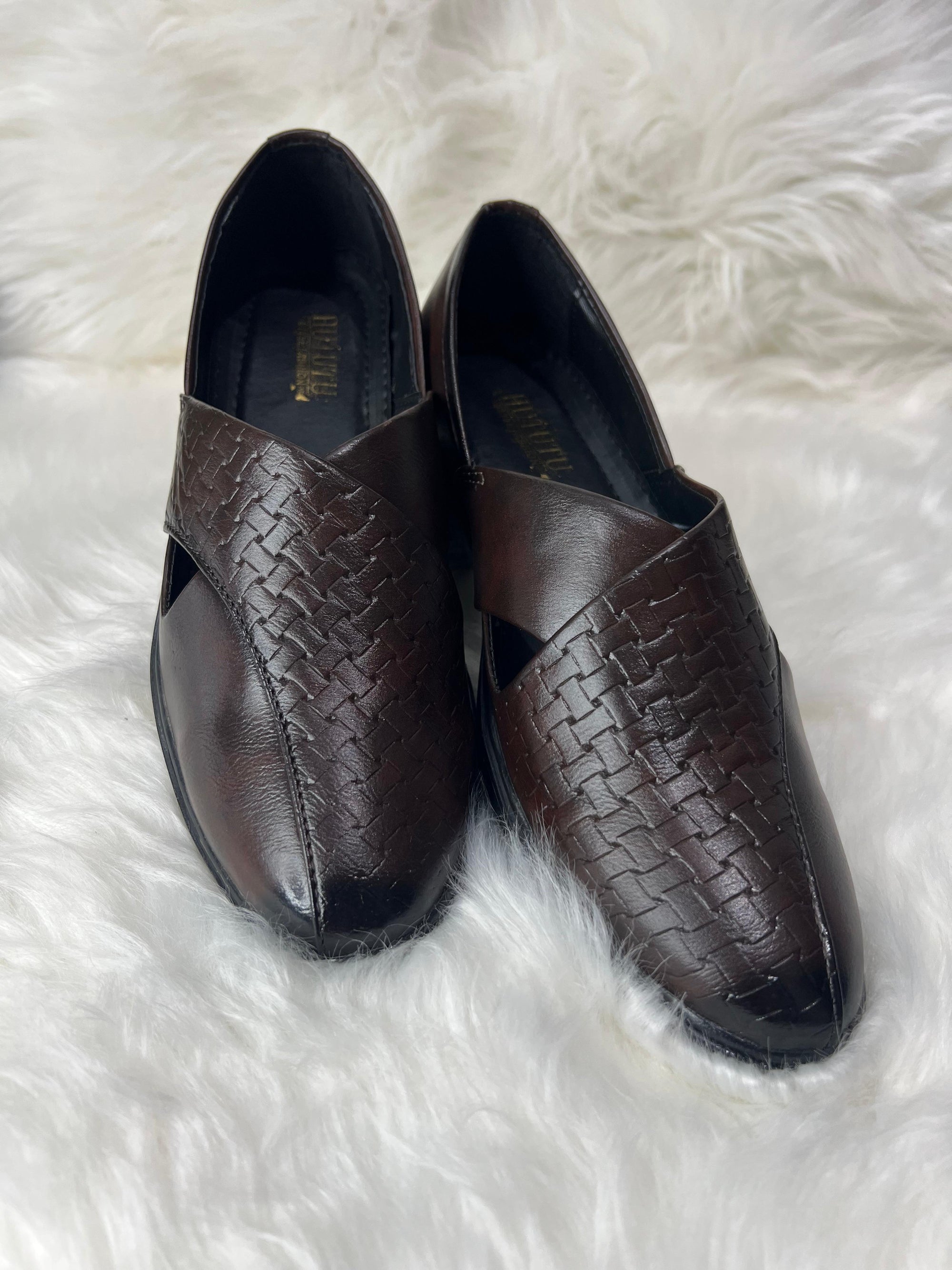 A timeless expression of South Asian elegance, our Heritage Series Peshawari sandals are handcrafted using top-grade leather and age-old techniques from Peshawar. Featuring soft cushioned soles, a secure buckled fit, and authentic cross-strap styling, these sandals blend comfort with tradition. Ideal for festive wear, grooms, and the modern man who walks with cultural pride.