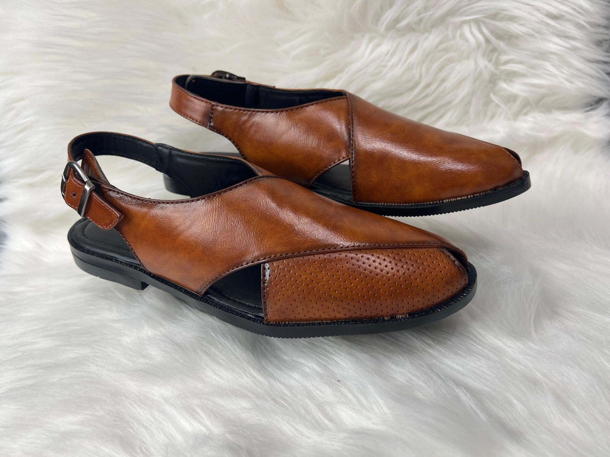 A timeless staple for the South Asian gentleman. Crafted with care, built for comfort—our Peshawari sandals are heritage in every step.