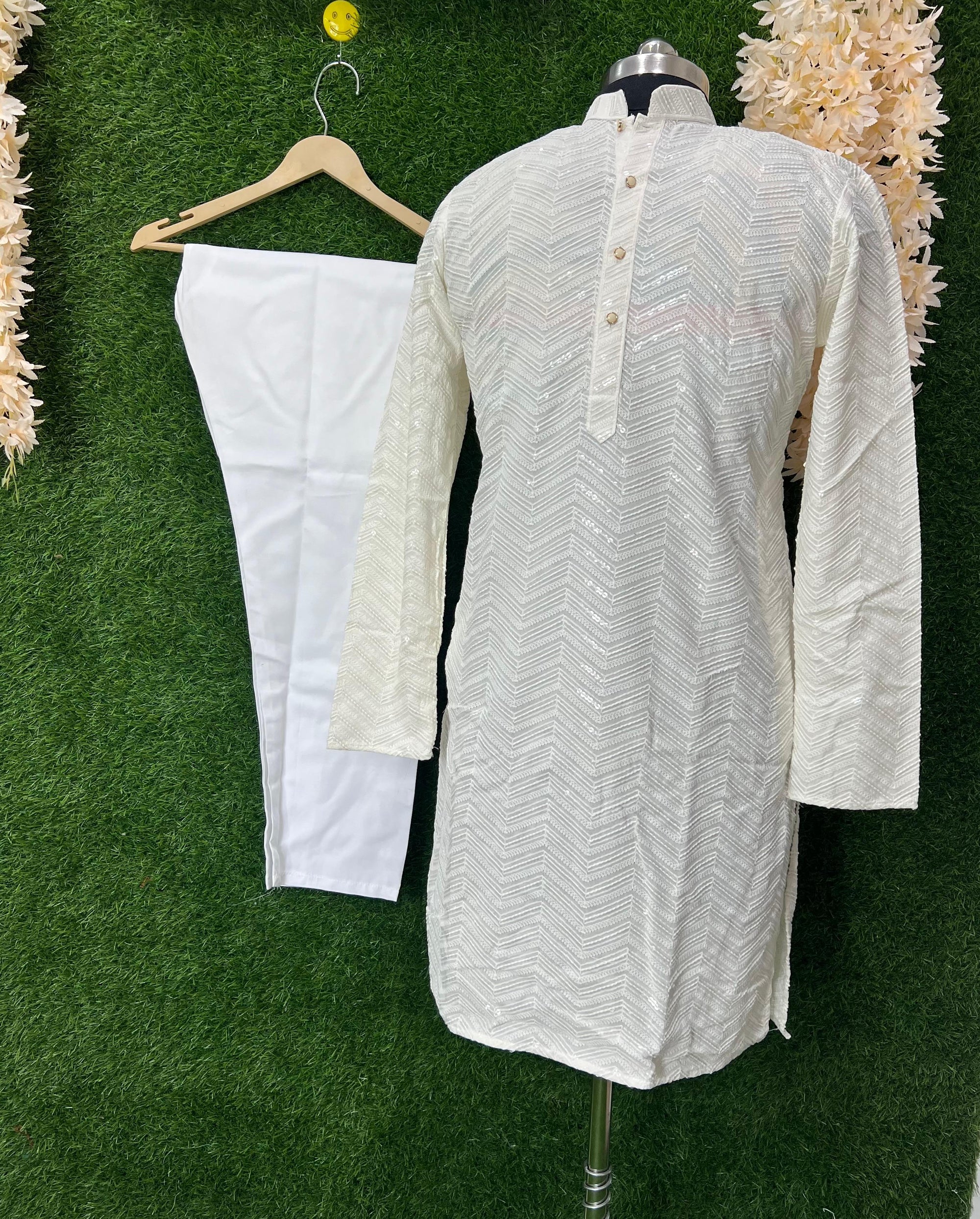 Feel effortlessly elegant in our luxurious Chikankari Kurta Set. With its fine threadwork and soft sequin accents, this piece strikes the perfect balance between cultural heritage and contemporary charm.