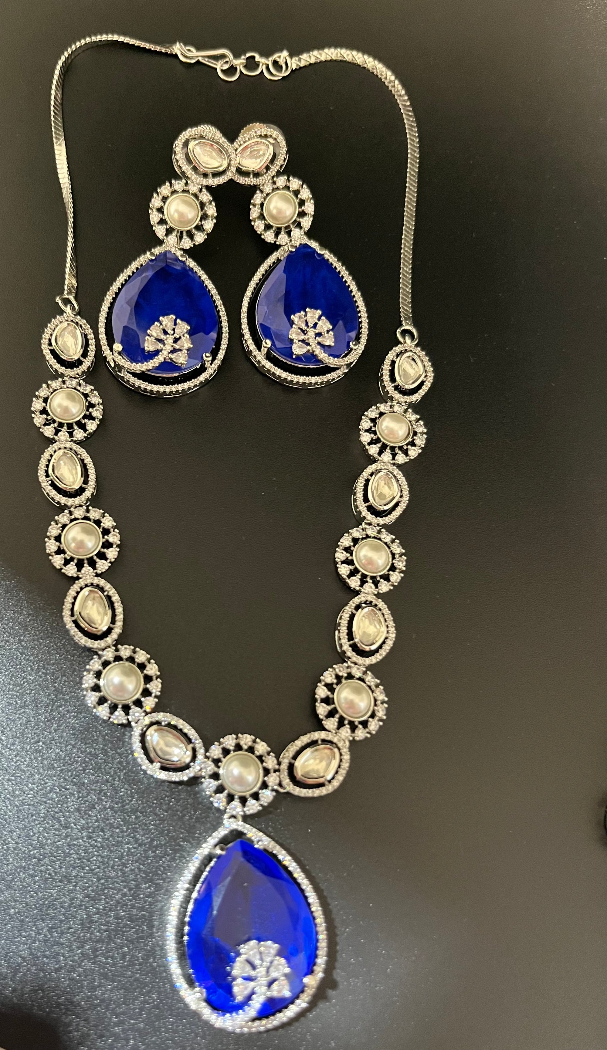 Rosy doublet stone with kundan and pearls necklace set